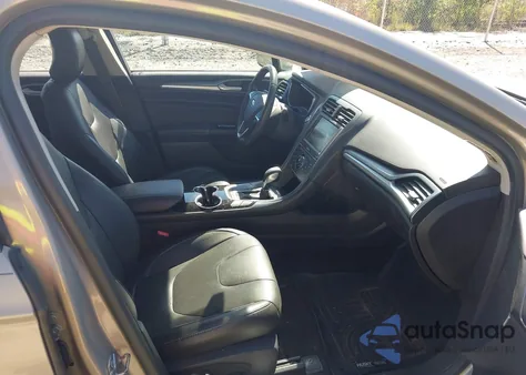 2015 Ford Fusion Energi Titanium from USA, damaged, VIN 3FA6P0SU7FR191324